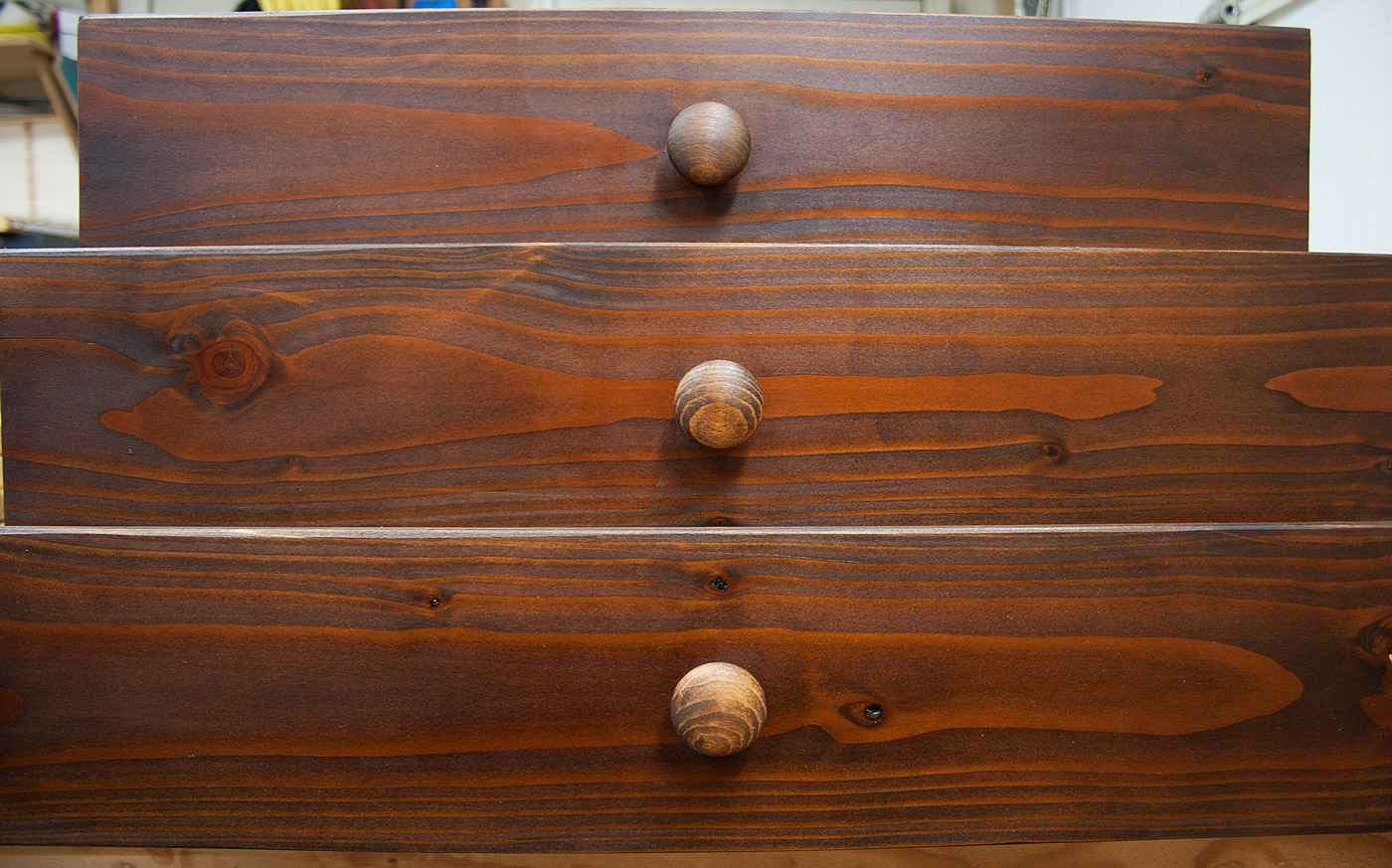 Darkened fir w/ 3 drawers