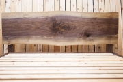 Live-edge walnut slab headboard